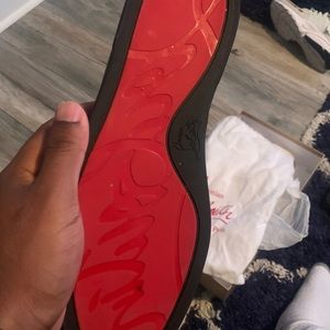 Christian louboutin Low top red bottoms